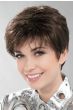 Woman in a long dark brown pixie wig with wispy bangs