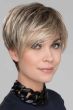 Woman in a small medium blonde pixie wig with longer edgy layers on top
