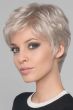 Woman in a cropped platinum blonde pixie wig