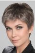 Woman in a light brown lace front pixie wig