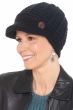 Woman in cute black knitted beanie hat with brim and side button for cancer patients