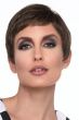 Woman in a cropped dark brown lace front pixie wig
