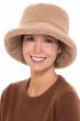 Woman in fluffy winter sherpa bucket hat