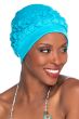 Woman in blue turban style swimming cap with ruffles