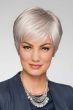 Woman in a light grey classic pixie wig with longer layers on top and side bangs