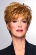 Woman in a medium brown pixie wig with side bangs and longer hair on the top