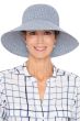 Woman in blue woven summer visor sun protection hat with big brim