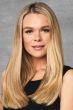 Woman in a 16" straight golden blonde invisible extension hair piece