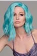 Woman in a past the shoulders aqua blue lace front wavy wig