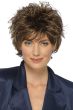 Woman in a long teased medium brown pixie wig with fringe bangs