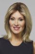 Woman in a shoulder length straight light blonde lace front wig