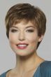 Woman in a short classic light brown pixie wig