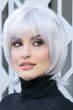 Woman in a past the chin silver layered bob wig with fringe bangs
