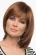 Woman in a shoulder length light auburn blunt bob wig with shorter layers along the face and fringe bangs