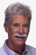 Older man in short, textured light grey toupee wig hairpiece