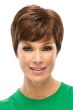 Woman in a classic auburn pixie wig with side fringe bangs