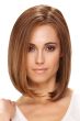 Woman in an auburn shoulder length blunt bob wig with curled under ends