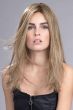 Woman in a 16.5" medium blonde wiglet hair topper for thinning hair