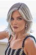 Woman in a shoulder length grey long layered lace front bob wig with side bangs