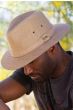 Cool guy outdoors in brimmed toyo beige men's safari hat for sun protection