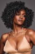 Afro American woman in a shoulder length curly black lace front wig