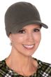 Woman in olive cotton baseball cap for cancer patients