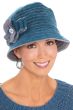 Woman in teal winter wool bucket hat for women with side flower