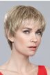 Woman in a medium brown close cropped lace front pixie wig