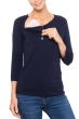 Woman in navy long sleeved chemo port t shirt with zipper open and chemo port accessible for cancer treatments