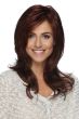 Woman in a past the shoulders dark auburn layered wig with long side bangs