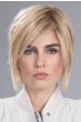 Woman in an 8.5" light warm blonde wiglet hair topper for thinning hair