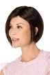 Woman in a dark brown chin length bob wig