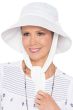 Woman in white cotton garden or outdoor hat with drawstring ties for cancer patients