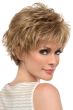 Woman in a textured light auburn pixie wig with fringe bangs