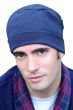 Man in soft navy organic cotton sleeping cap or night cap with adjustable cuff for balding, hair loss or chemo
