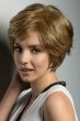 Woman in a short dark blonde lace front wiglet with side bangs
