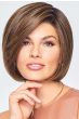 Woman in a chin length medium brown lace front blunt bob wig