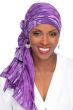 Woman in purple tie dye long rectangle head scarf tied into a head wrap
