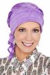 Woman in purple pre tied head scarf with padding for cancer patients