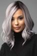 Woman in a past the shoulders lavender curly lace front wig