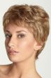 Woman in a petite golden blonde classic pixie wig