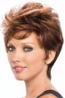 Woman in a medium auburn pixie wig with longer layers on top