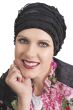 Woman in black sleeping cap with ruffled fabric for women with cancer