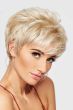 Woman in a long messy light blonde pixie wig with textured bangs