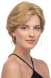 Woman in a long dark blonde layered remy human hair pixie wig