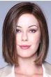 Woman in a shoulder length dark brown lace front blunt bob wig