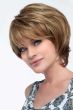 Woman in a short layered red blonde wig with side bangs