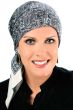 Woman in white and black paisley square cotton head scarf tied in bow for women with cancer