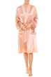 Woman in long pink 100% silk bathrobe