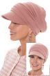 Woman in pink newsboy brimmed cancer hat with slouchy draping in back